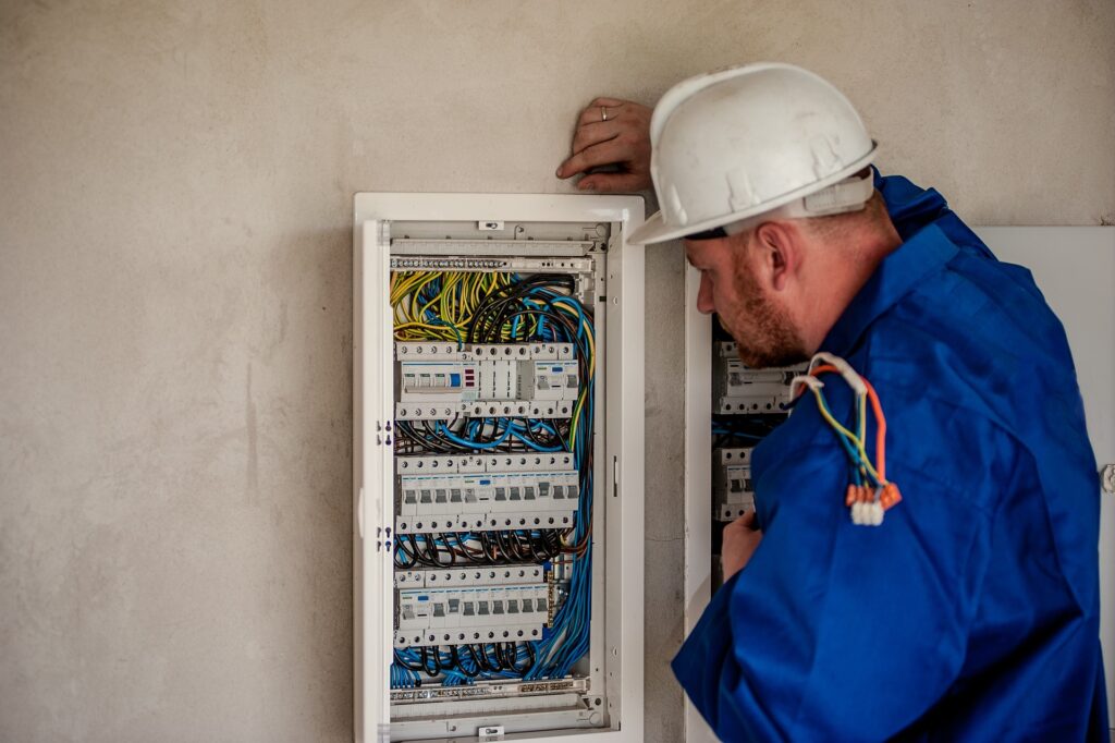 An electrician fixing wires